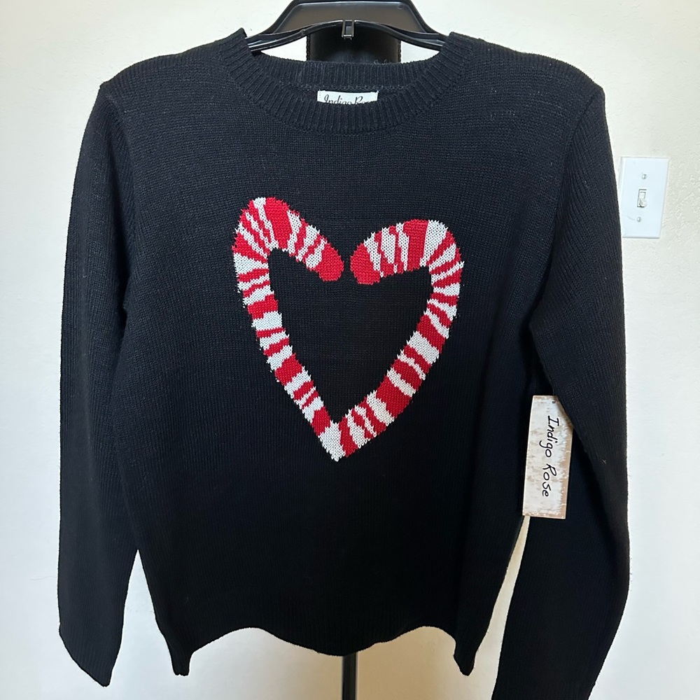 Indigo rose Black Sweater with‎ 2 candy canes logo. Size Large. NWT.